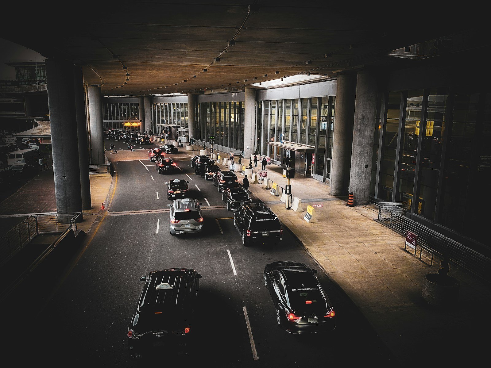 a group of cars parked in a parking lot